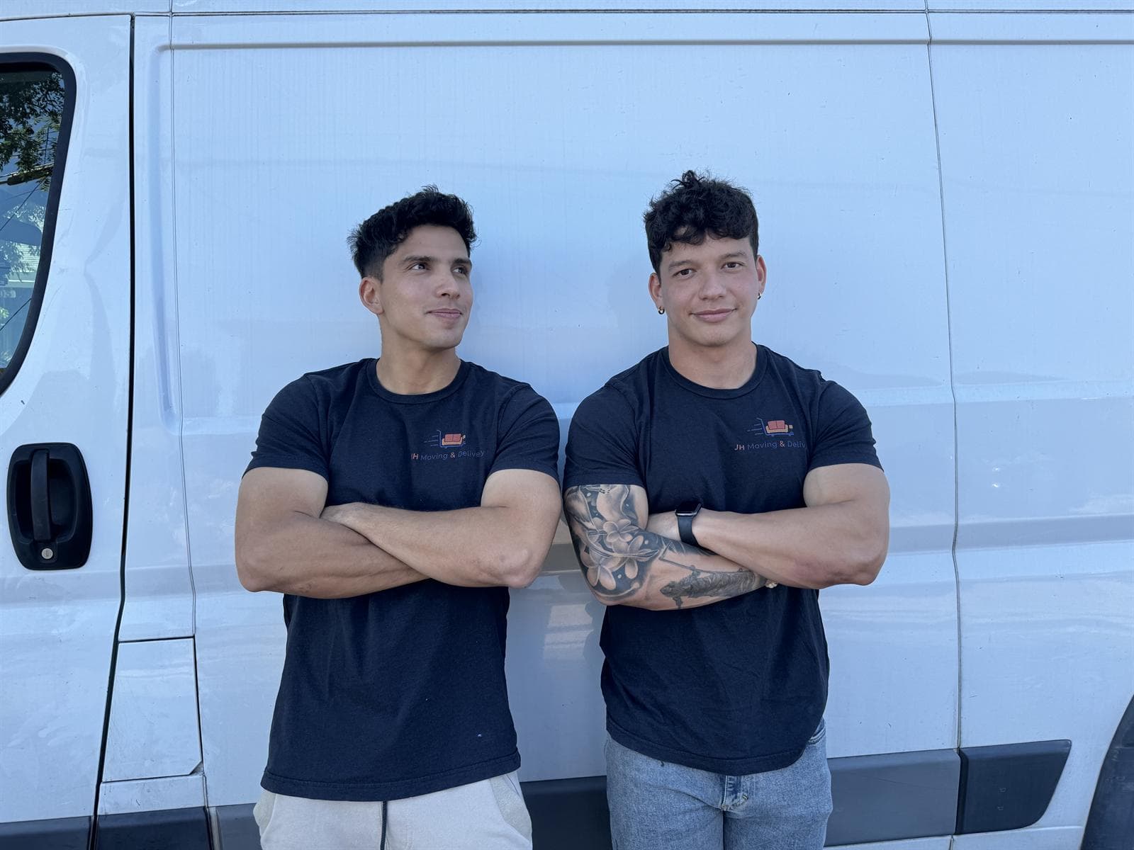 moving services — JH Moving team wrapping and loading