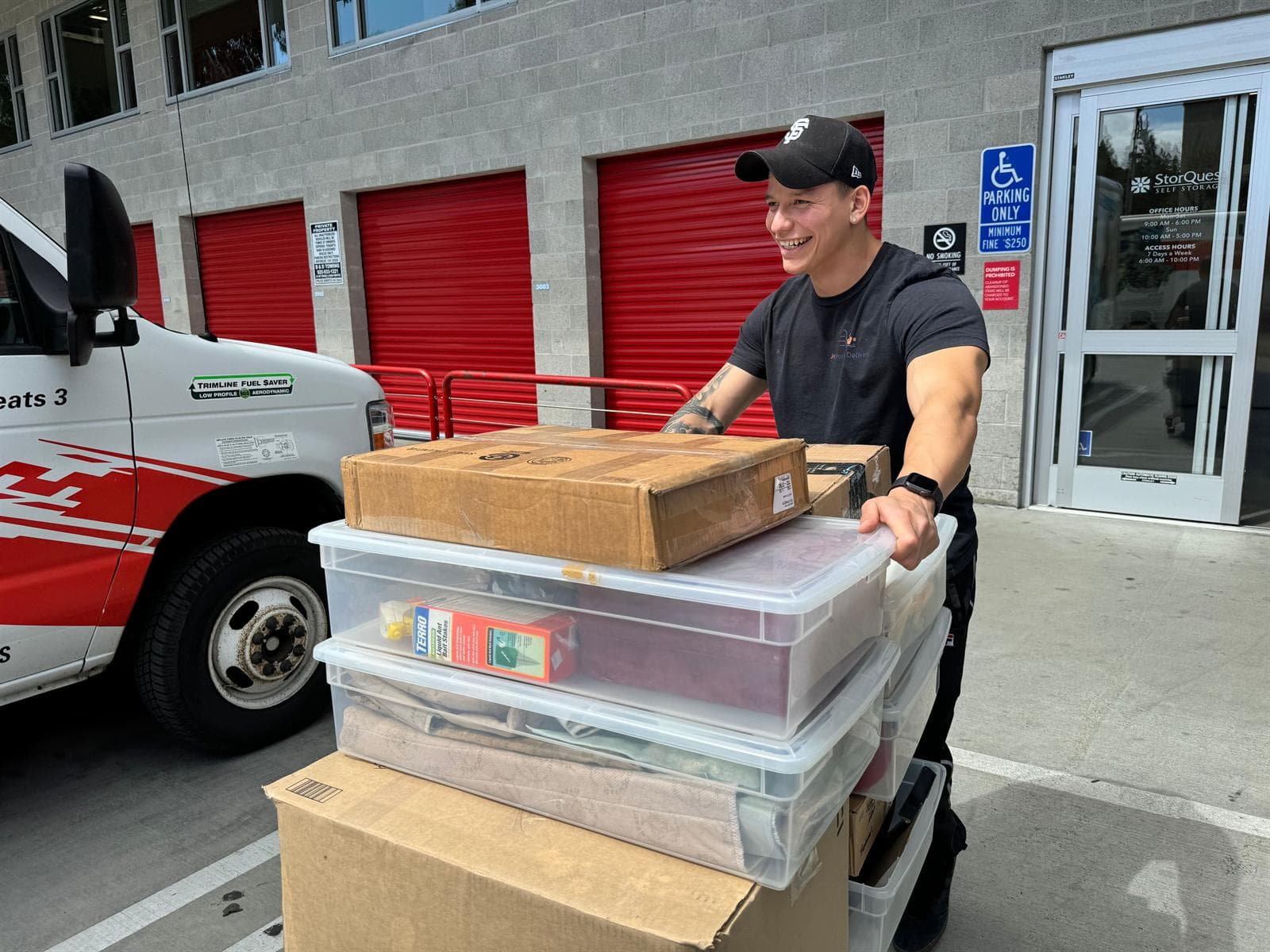 packing services — JH Moving team wrapping and loading